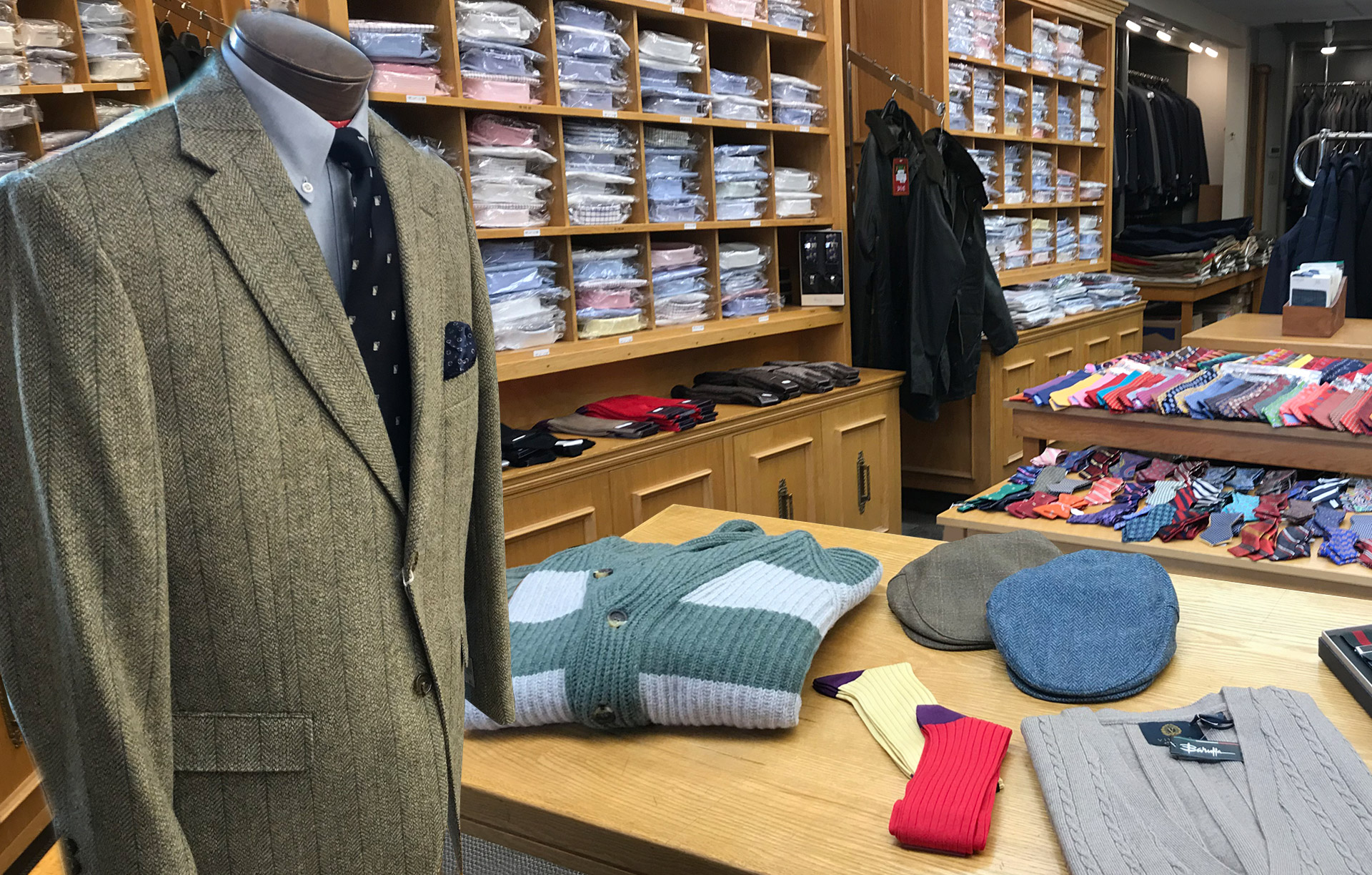 Eddie Jacobs Ltd. store showing sweaters, ties, shirts, and suits